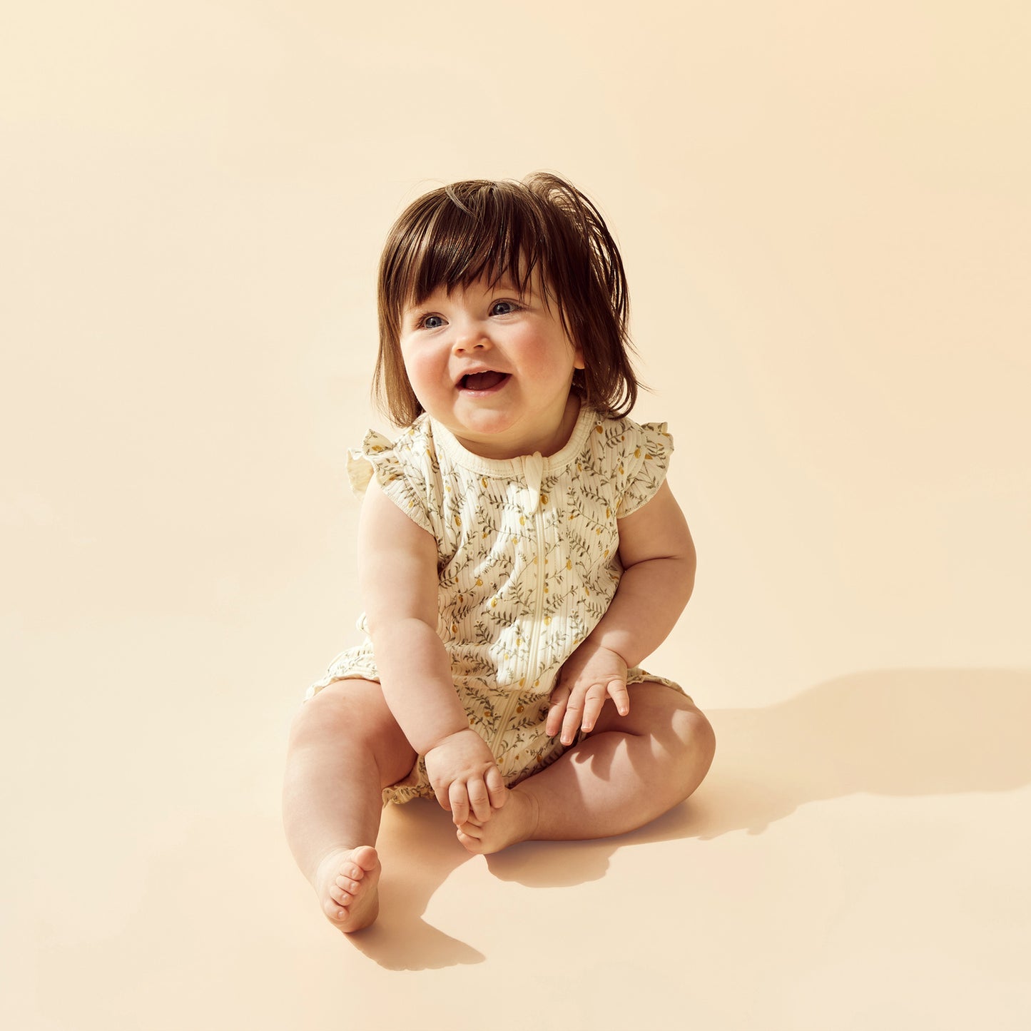 Wilson & Frenchy Lemon Leaf Organic Ruffle Zipsuit